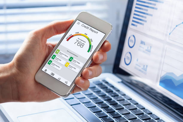 Credit Report with Score rating app on smartphone screen showing creditworthiness of a person for loan and mortgage application based on payment history and debt usage, budget management performance Credit Report with Score rating app on smartphone screen showing creditworthiness of a person for loan and mortgage application based on payment history and debt usage, budget management performance usage stock pictures, royalty-free photos & images