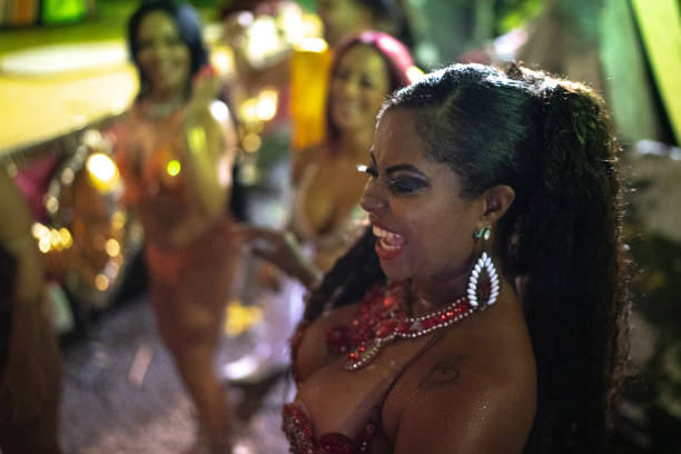 istock People celebrating and dancing brazilian carnival 1203955140