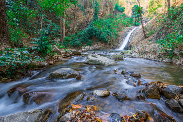 istock Hot Springs Onsen Natural Bath Surrounded by red-yellow leaves. In fall leaves fall,waterfall in the natural forest. at National Park Chae Son, Lampang Thailand. 1203958841