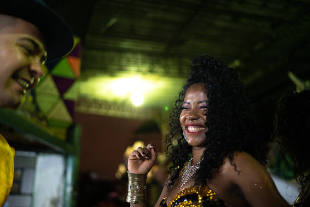istock People celebrating and dancing brazilian carnival 1203958886