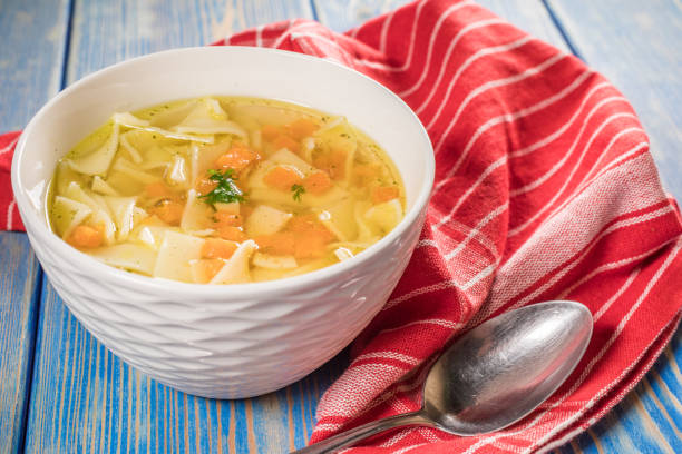istock Broth - chicken soup in a bowl. 1203959346