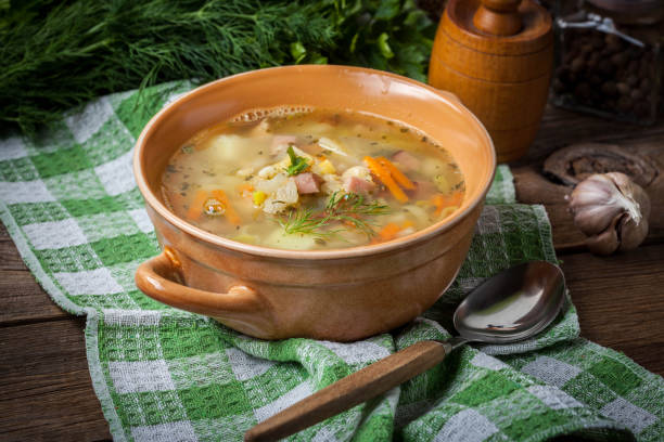 istock Pea soup with vegetables and bacon. 1203959990