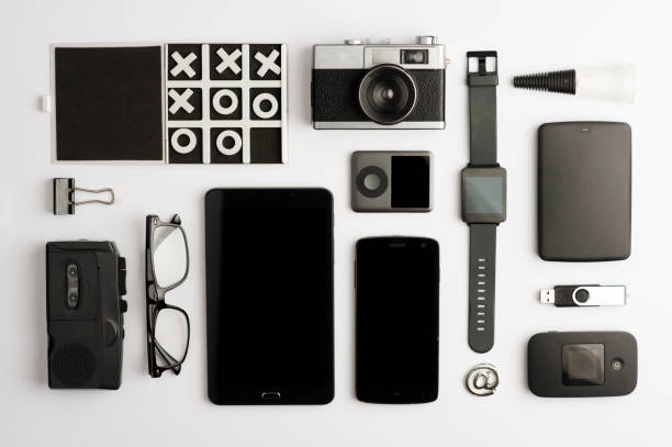 istock set of fashion objects, phone, camera, game, glasses, recorder, player, clock, hard drive, cable, glue boat, electronic phonebook, headphones, screwdriver, click, carabiner, moden, white background 1203960252