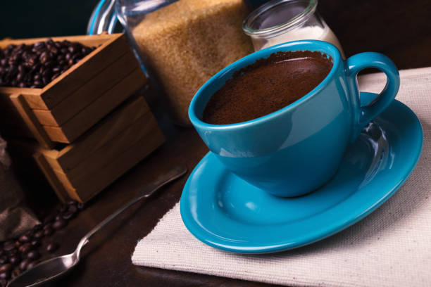 istock Empty cup of coffee and jute bags 1203960614