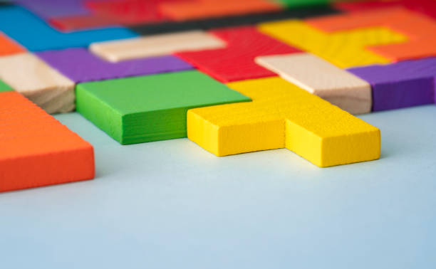 istock Geometric shapes on a wooden background 1203960895