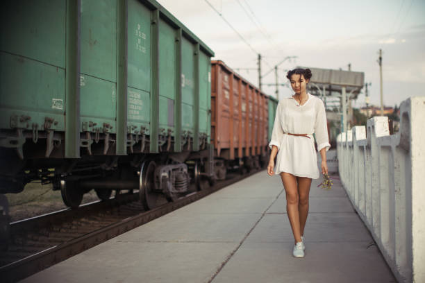 istock Young woman waiting for someone 1203963801