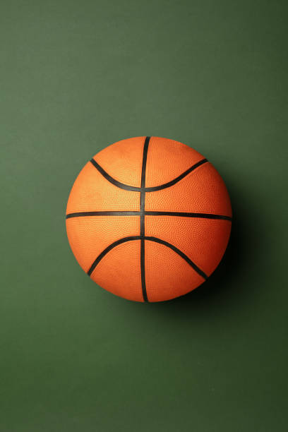 istock Sport equipment isolated on green studio background 1203963890