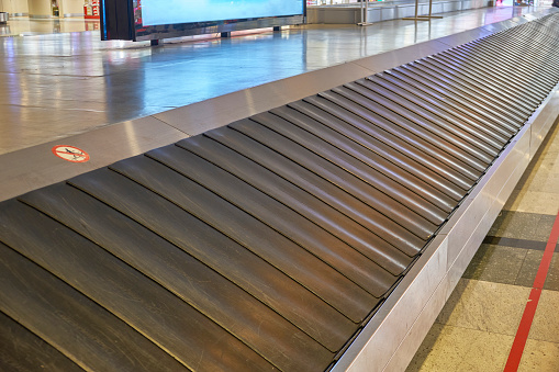 Treadmill of the airport baggage carousel.