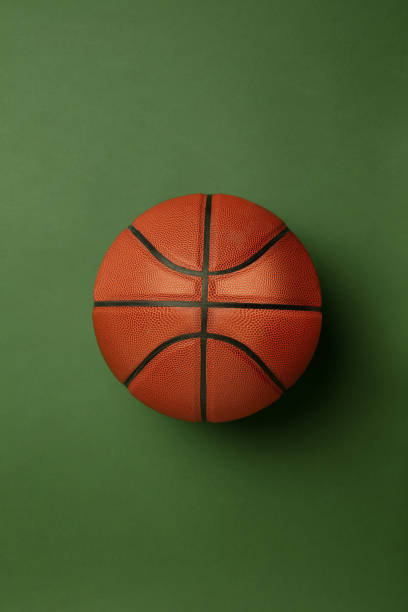 istock Sport equipment isolated on green studio background 1203963905