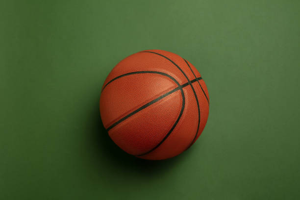 istock Sport equipment isolated on green studio background 1203963961