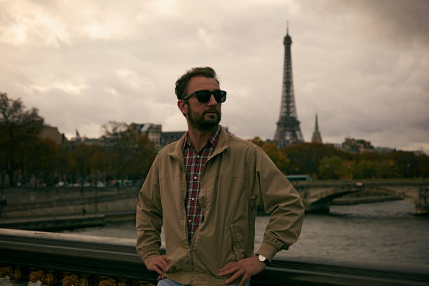 istock Handsome man enjoying in Paris. 1203965271