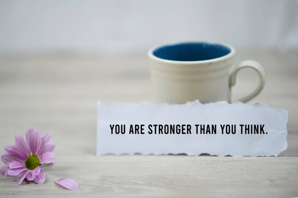 istock You are stronger than you think, a paper note with morning coffee. 1203965276