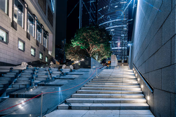 istock Hong Kong night, pedestrian overpass stairs. 1203966931