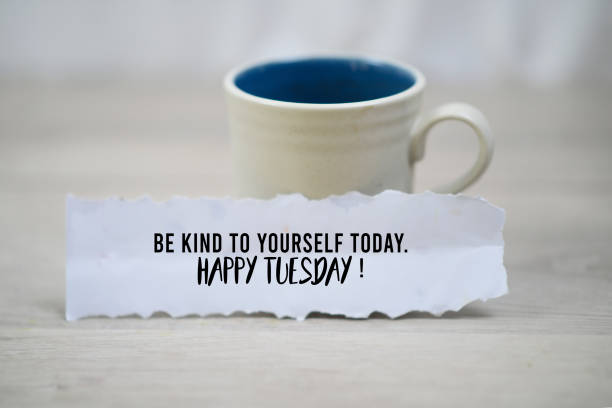 istock Happy Tuesday concept with note on paper - Be kind to your self today. 1203967272
