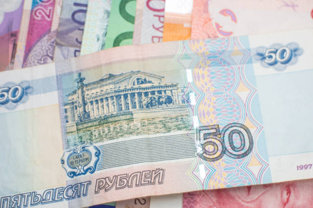 istock Russian Ruble and various international banknotes 1203967491