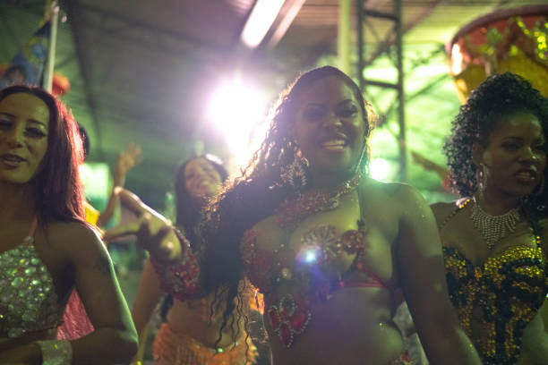 istock People celebrating and dancing brazilian carnival 1203968993