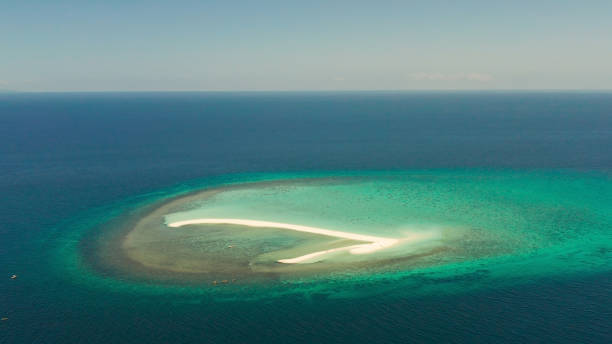 istock Tropical island with sandy beach. Camiguin, Philippines 1203969342