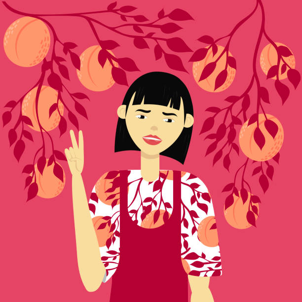 istock Beautiful girl in a dress with a pattern of peaches 1203969768