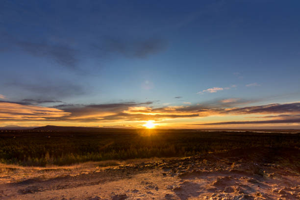 istock Sunrise in the volcanic crater Kerid (Iceland) 1203971797