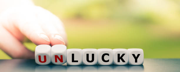 istock Hand turns dice and changes the word 