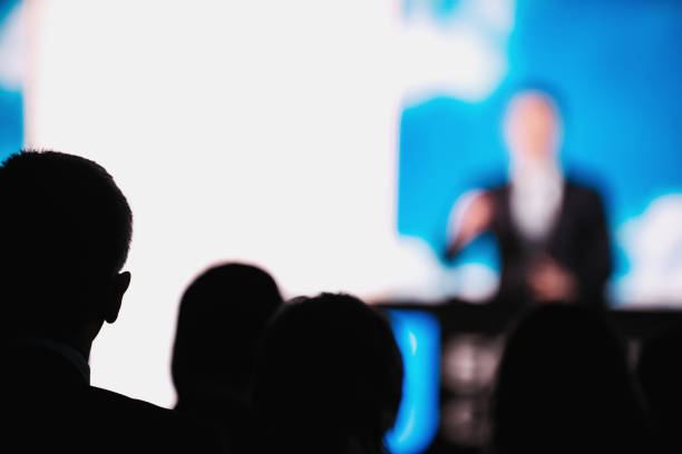 istock Presentation Of A Speaker On The Stage 1203973237
