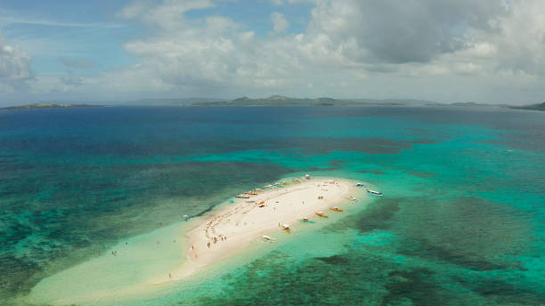 istock Tropical island with sandy beach. Naked Island, Siargao 1203973349