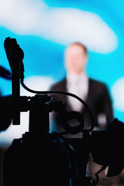 istock Camera Recording Presentation Of A Speaker 1203974178