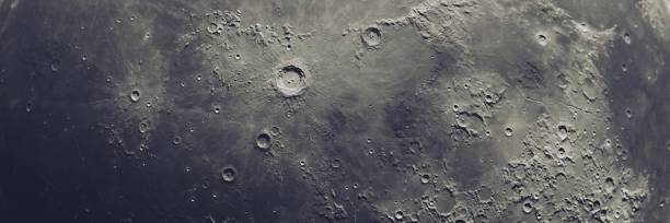 istock Realistic Moon in the outer space Isolated on Black Background, 3d rendering 1203982166
