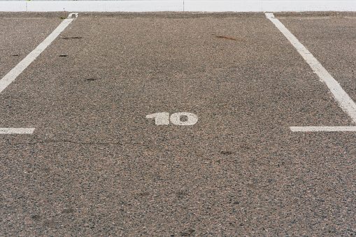 free empty parking space for cars number ten