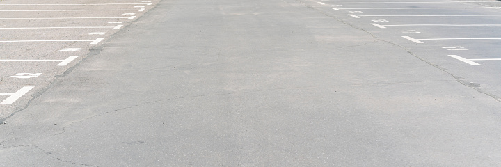 empty asphalted parking lot with markings, panorama