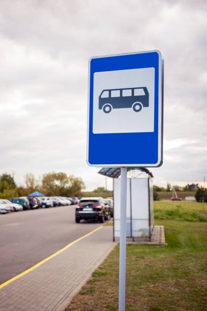 istock bus stop sign near empty bus stop 1203982830