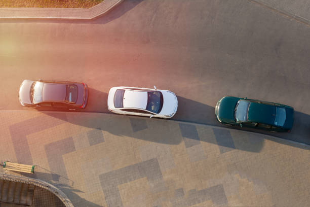 istock cars are parked along road view from above 1203982973