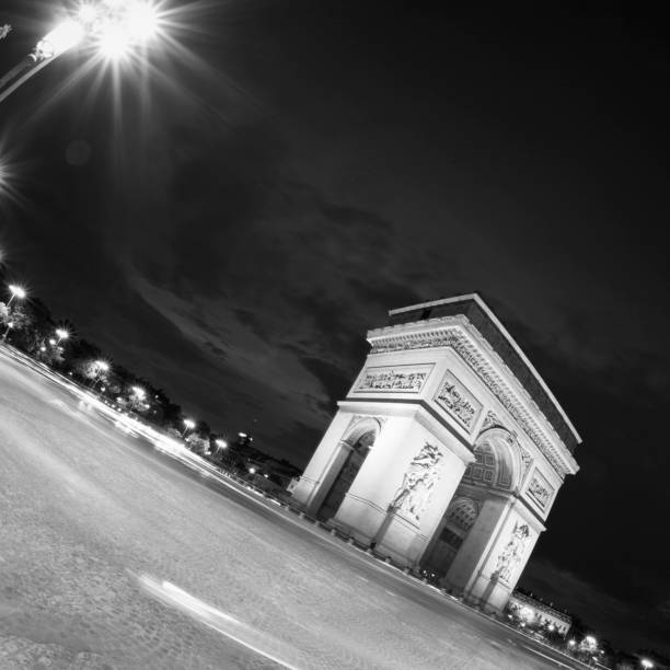 istock Arc De Triomphe at night in Paris, France 1203985675