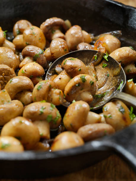 istock Butter and Garlic Mushrooms with Onions 1203988634
