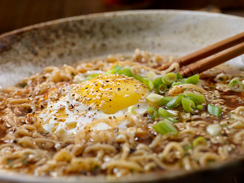 Ramen Soup with Fried Egg, Green Onions and Sesame Seeds