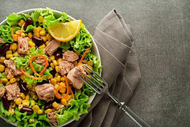 istock salad with tuna, corn and beans 1203988781