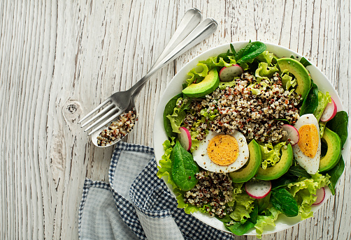 Green salad meal with quinoa