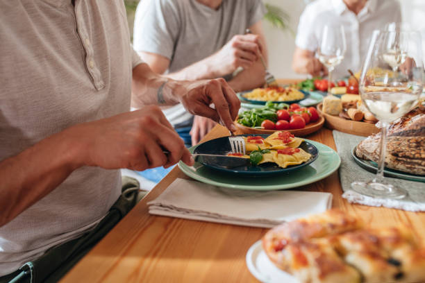istock Group of People Eating 1203991634