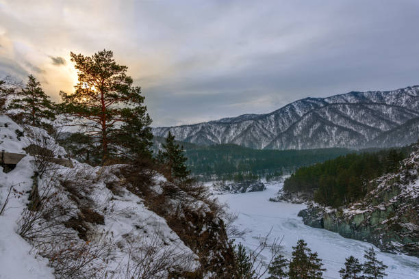 istock View of snow-capped mountains and mountain river 1203993750