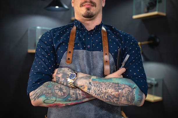 istock Gang barber shop owner 1203995634