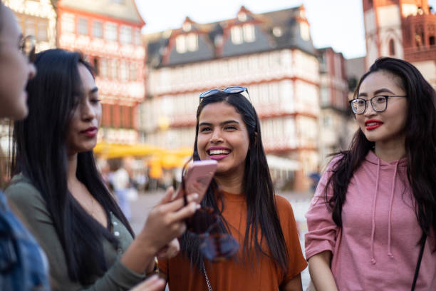 istock Multi-ethnic women enjoying their vacation together 1203996640
