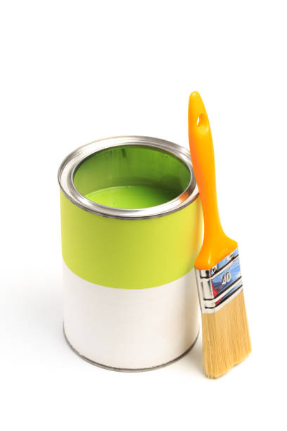 istock Can with green paint with brush  isolated on white background - Image 1203997224