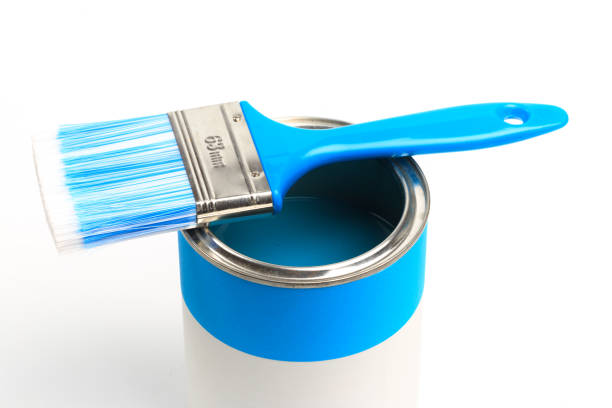 istock Can with blue paint with brush  isolated on white background - Image 1203998006