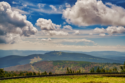 Looking over the Harz National Park in Germany. While many trees are damaged by Bark Beetle they are no longer able to stay healthy due to the ongoing climatic change. The floors are dry and it has rained too little in recent years.