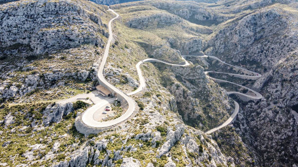 An aerial view of Sa Calobra.Sa Calobra is a small village in the Escorca municipality on the northwest coast of the Spanish Balearic island of Majorca. The port village is a popular destination for coach trips and road cyclists and is accessible by a single winding roadThe climb is officially called the Coll del Reis or the Coll de Cal Reis, the pass on 682 metres (2,238 ft) altitude, though it is often referred to by the name of the village at its base and was built and is considered to be \