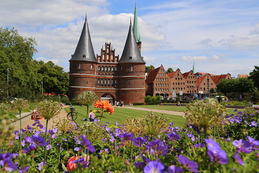 Historic town of Lubeck with famous Holstentor gate in summer