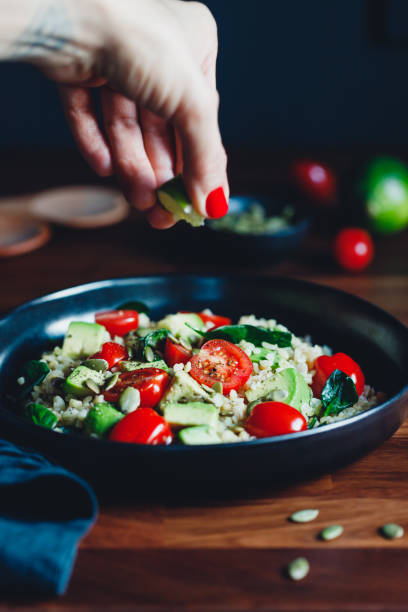 istock Healthy salad with bulgur, avocado, spinach and cherry tomatoes. 1204000012