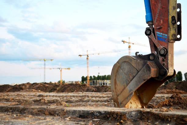 istock Excavator bucket on the construction site 1204005511