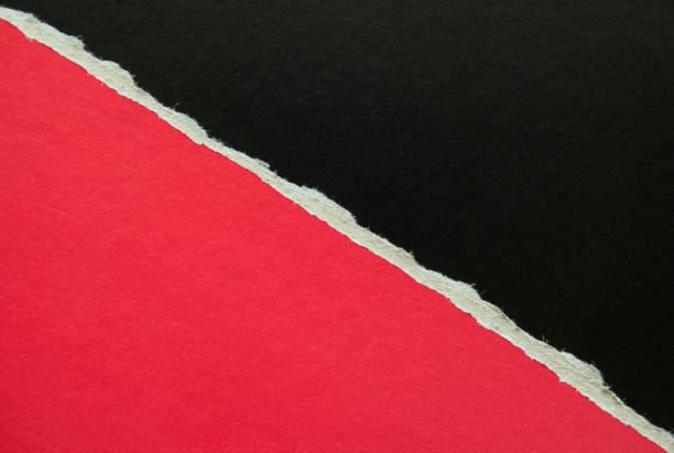 istock Black and red torn sheet of cardboard paper with diagonal border texture background. Can be used for text. 1204008109