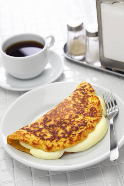 istock cachapa, venezuelan corn pancake with handmade cheese 1204009384